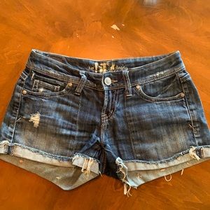 Jean shorts- indigo/dark blue in color.